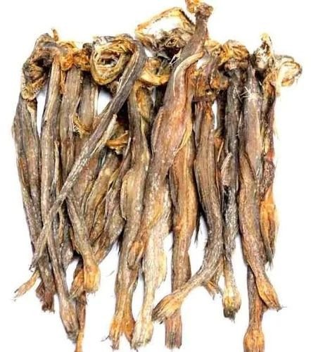 Bundle of dried fish tied together, showing long, brown, dehydrated bodies on a plain background